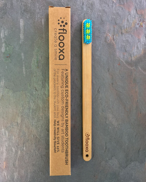 Bamboo toothbrush front view and packaging