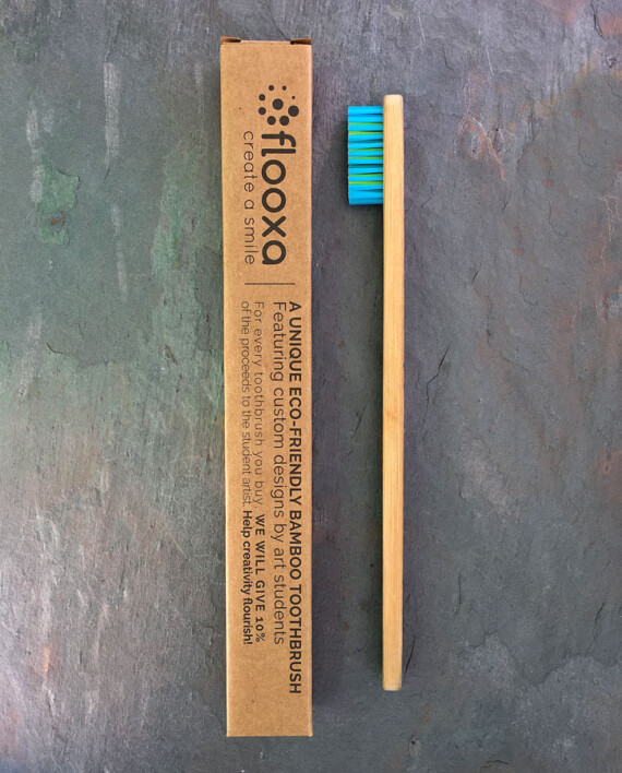 Bamboo toothbrush side view and packaging
